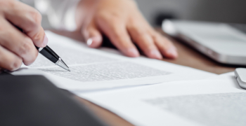 Person reading over documents